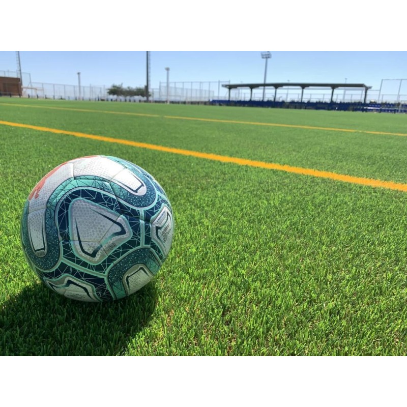 Mise en place d'un gazon synthétique de 60mm pour terrain de foot